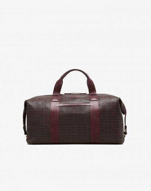 Brown braided leather travel bag
