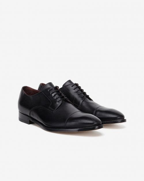 Black calfskin derby shoes with toe cap
