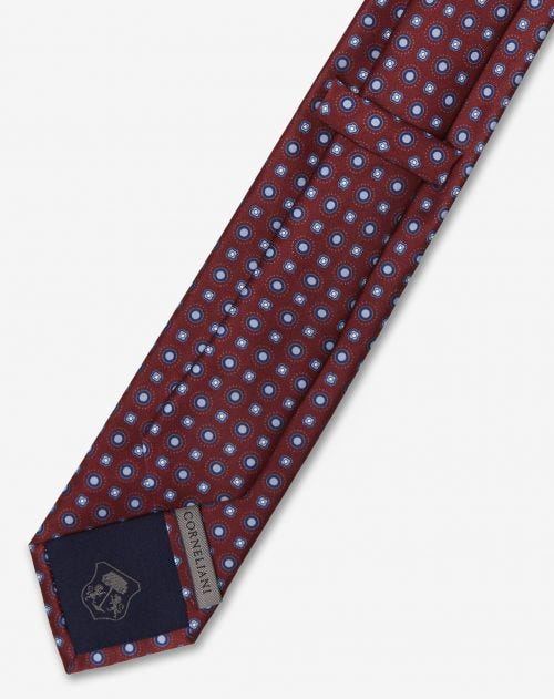 Cravatta bordeaux in seta con motivi azzurri