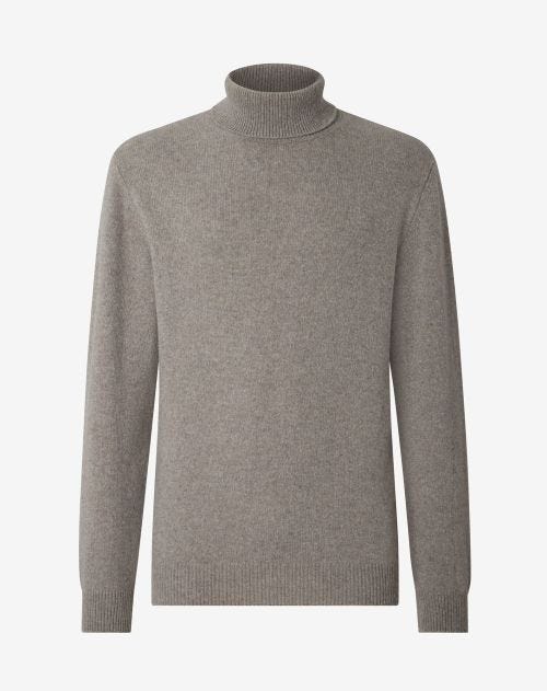 Beige pure cashmere turtle-neck sweater with a mouliné effect.