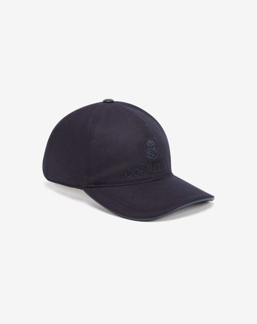 Blue wool baseball cap with embroidered logo.