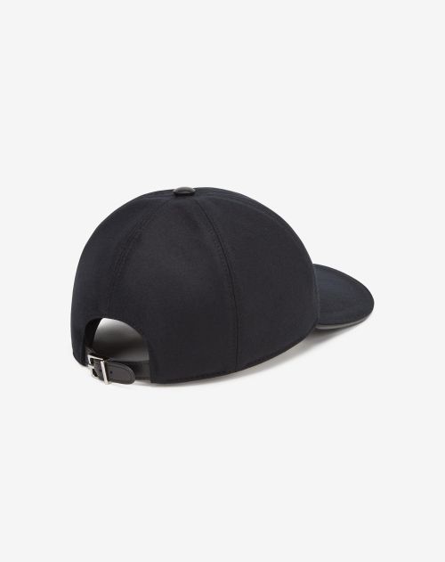 Black wool baseball cap with embroidered logo.